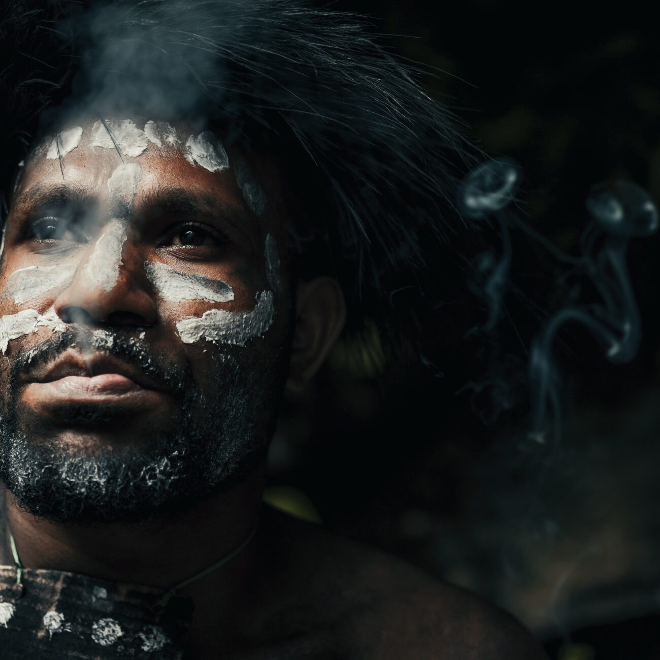 closeup-of-black-man-from-papua-indonesia-tribe-2022-06-22-14-35-06-utc