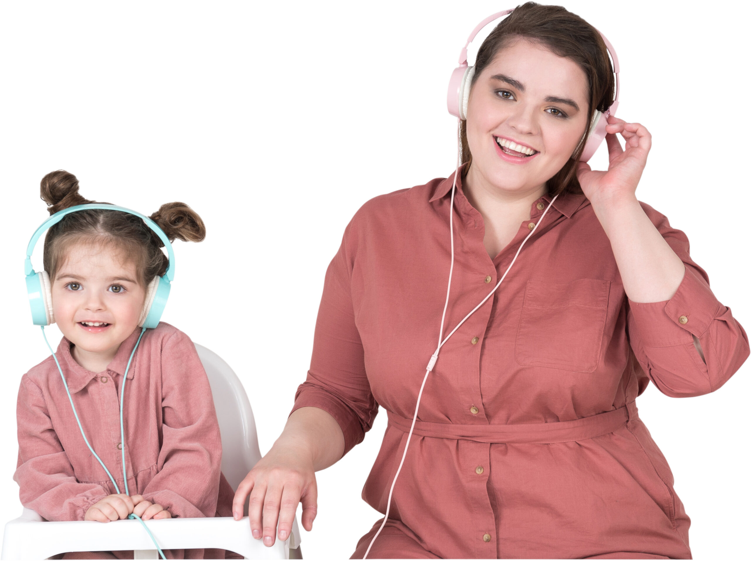 a woman and a child wearing headphones sitting on a chair