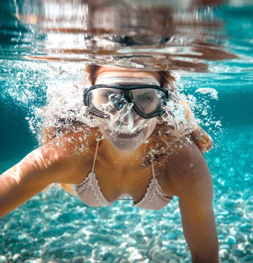 Snorkeling woman in the tropical sea