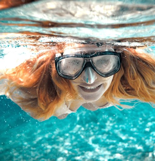 Snorkeling woman in the tropical sea